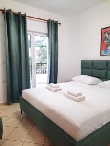 Amarildo Hotel客房内的一张或多张床位