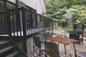 Un balcon sau o terasă la NASU terrace LEI プライベートバレルサウナとハーブ香るガーデンBBQ +38 fotografii