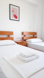 Amarildo Hotel客房内的一张或多张床位