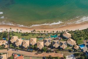 イタシミリンにあるBali Bahia 202 Frente ao mar Itacimirimのビーチに隣接するリゾートの航空写真
