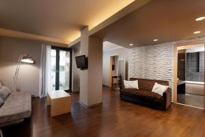 Posezení v ubytování Elysion Hotel