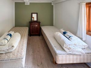 Ένα ή περισσότερα κρεβάτια σε δωμάτιο στο 6 person holiday home in Læsø