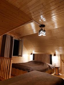 Postel nebo postele na pokoji v ubytování Hotel alisa in racha