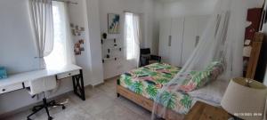 Postel nebo postele na pokoji v ubytování Las Palmas villa two bedrooms