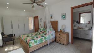 Postel nebo postele na pokoji v ubytování Las Palmas villa two bedrooms