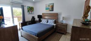 Postel nebo postele na pokoji v ubytování Las Palmas villa two bedrooms