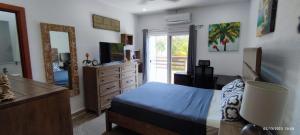 Postel nebo postele na pokoji v ubytování Las Palmas villa two bedrooms