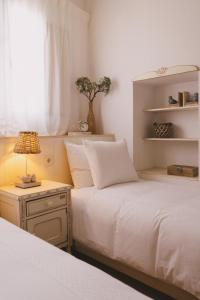 Postel nebo postele na pokoji v ubytování Casa das Maria's - Casas com EnCanto + 34 fotografií