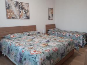 Postel nebo postele na pokoji v ubytování Il Giardino di Anna