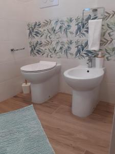 Koupelna v ubytování Il Giardino di Anna + 5 fotografií