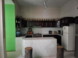 Kuchyň nebo kuchyňský kout v ubytování Hostal Tequila