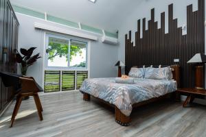 Voodi või voodid majutusasutuse Luxury Hilltop Dual Villas With Stunning Sea Views & Pools ! toas