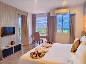 Postel nebo postele na pokoji v ubytování Bright Hotel + 37 fotografií