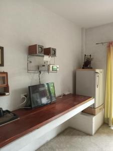 TV a/nebo společenská místnost v ubytování YA VEe