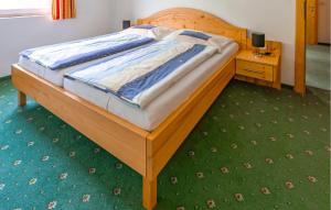 เตียงในห้องที่ Gemütliche Ferienwohnung