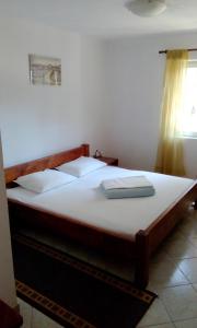 Postel nebo postele na pokoji v ubytování Apartments Matulic