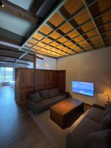 O zonă de relaxare la 古民家ラグジュアリーホテル 金井西洋館