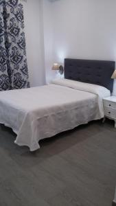 Posteľ alebo postele v izbe v ubytovaní Hostal Boutique Bajamar