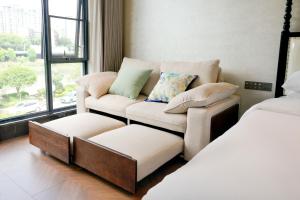 Candy Homestay Zhangjiajie Complimentary Airport & Train Station Pickup客房内的一张或多张床位