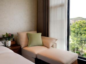 Candy Homestay Zhangjiajie Complimentary Airport & Train Station Pickup客房内的一张或多张床位