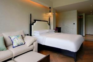 Candy Homestay Zhangjiajie Complimentary Airport & Train Station Pickup客房内的一张或多张床位