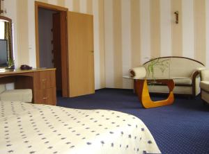 Llit o llits en una habitació de Finlandia Hotel