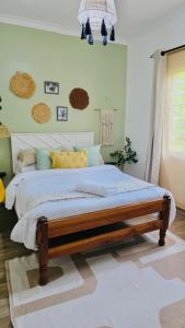 Ένα ή περισσότερα κρεβάτια σε δωμάτιο στο CasaMia