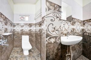 Ένα μπάνιο στο Collection O MVP Double Road