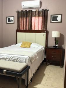 Un ou plusieurs lits dans un hébergement de l'établissement Hotel Lima Park