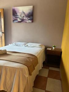 Un ou plusieurs lits dans un hébergement de l'établissement Hotel Lima Park