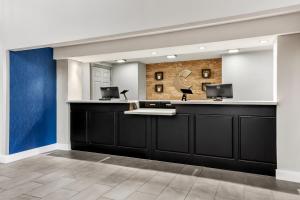 a dental office with a blue and white wall at Comfort Inn & Suites Nashville Near Tanger Outlets I-24 Antioch in Antioch +52 photos