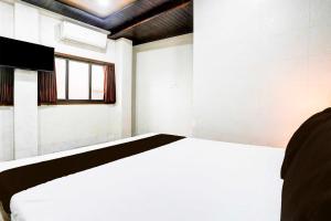 Collection O Dombivali客房内的一张或多张床位