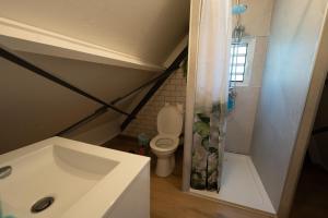 Baðherbergi á Appartement COCO T4 en R+1 proche du lagon