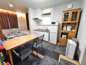 Dapur atau dapur kecil di BBQ 夏季プール マッサージチェア 舞子スノーリゾート 加賀屋旅館 南魚沼 Kagaya Ryokan 加贺屋旅馆