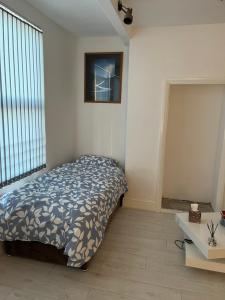 En eller flere senge i et værelse på Santal + 5 billeder