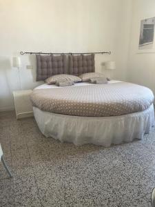 Postel nebo postele na pokoji v ubytování B&B Cristina e Stefano
