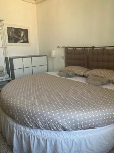 Postel nebo postele na pokoji v ubytování B&B Cristina e Stefano
