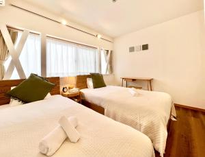 MX Hotel Roppongiにあるベッド