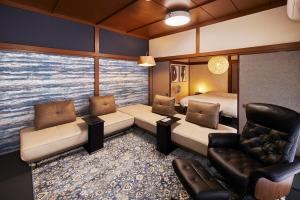 Posezení v ubytování マイグレ海の声 + 42 fotografií