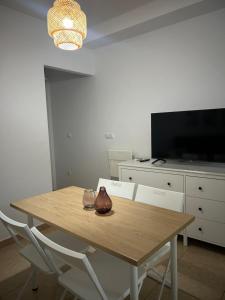 TV a/nebo společenská místnost v ubytování Apto cerca de playa Regla con garaje