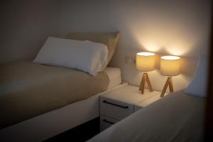 Letto o letti in una camera di KopfRausch Appartements