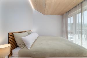 Letto o letti in una camera di KopfRausch Appartements