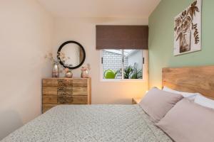 Postel nebo postele na pokoji v ubytování Casa Calma Zona Hospital