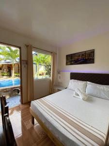 Postel nebo postele na pokoji v ubytování Foxtail Siargao Island Guesthouse