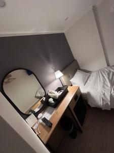 Postel nebo postele na pokoji v ubytování About Stay Dongdaemun + 30 fotografií