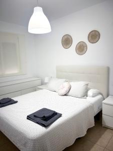 Postel nebo postele na pokoji v ubytování Apto cerca de playa Regla con garaje