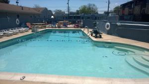 a large pool of blue water with a camera at Atlantic Motel in Point Pleasant Beach