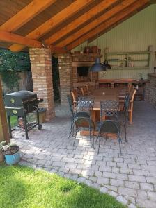 Patio alebo iná vonkajšia časť ubytovania Apartmán Na statku