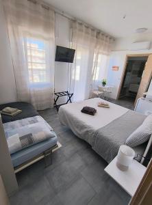 Postel nebo postele na pokoji v ubytování b&b Casa Balai 72 a 100 mt dal mare