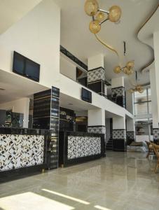 Televisyen dan/atau pusat hiburan di Jasmin Blue hotel